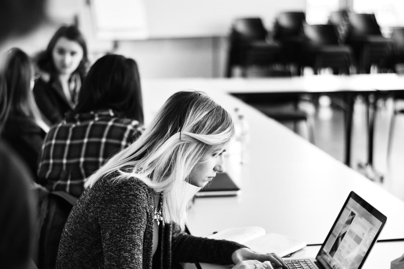 lady-at-desk-starting-at-laptop.jpg