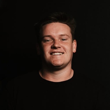 Portrait photo of Sam Ryan, Product Marketing Specialist at Stake.