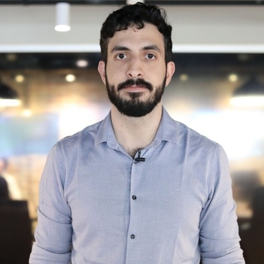 Portrait photo of Rodrigo Lima, Market Analyst at Stake.