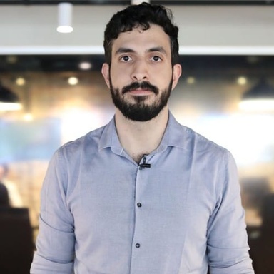 Portrait photo of Rodrigo Lima, Market Analyst at Stake.